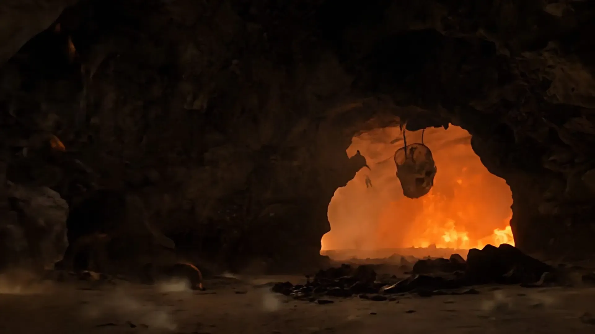 Grim Skull Hanging in Fiery Hell Cave Background for Horror Projects